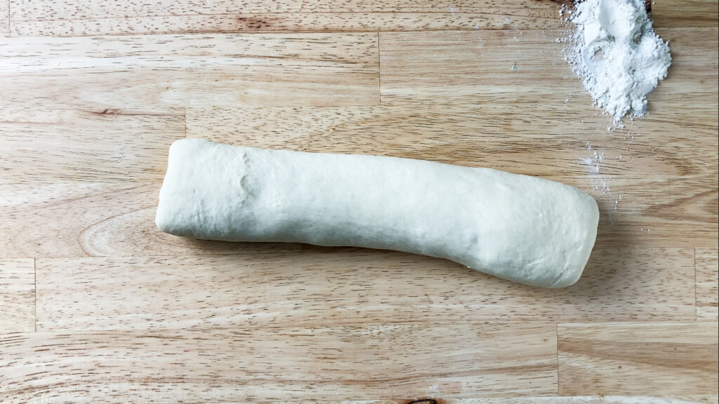 bread dough in a log ready to bake