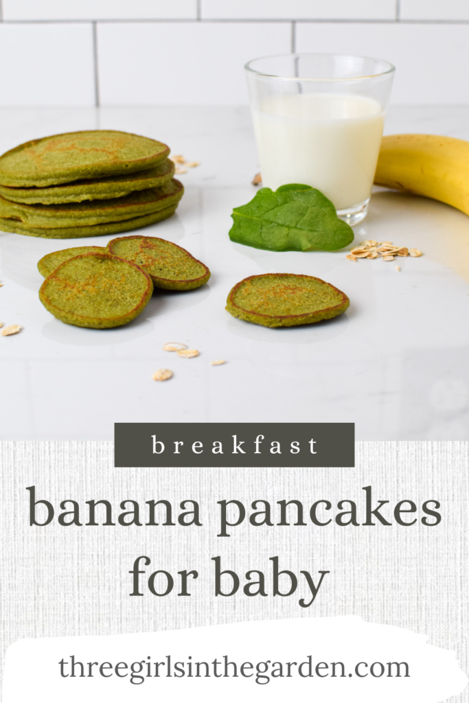 green banana pancakes for a baby stacked up with spinach leaf and milk