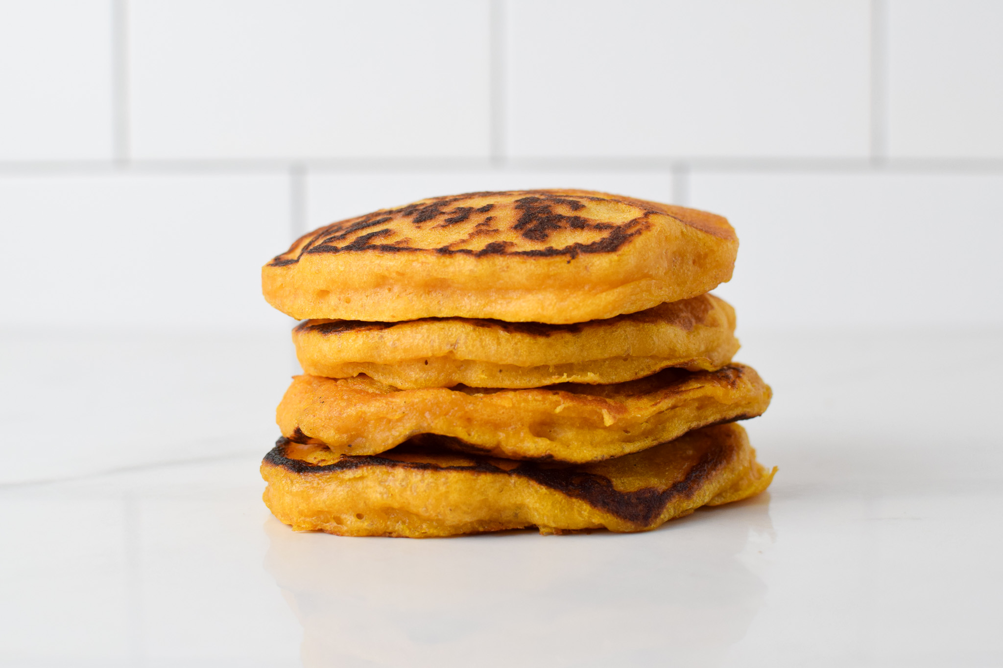 stack of sourdough pumpkin pancakes from scratch