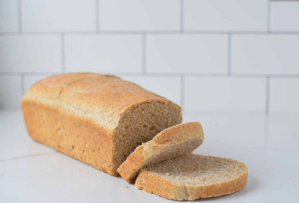 whole wheat bread sliced on a counter