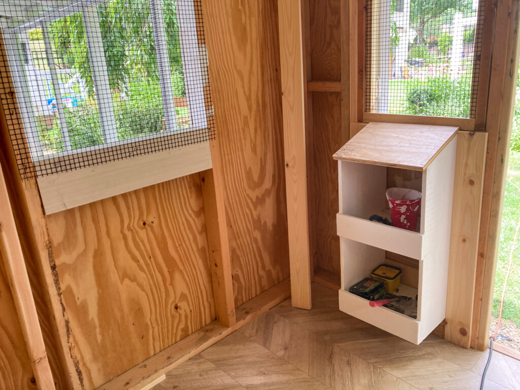 nesting box for chickens inside a shed