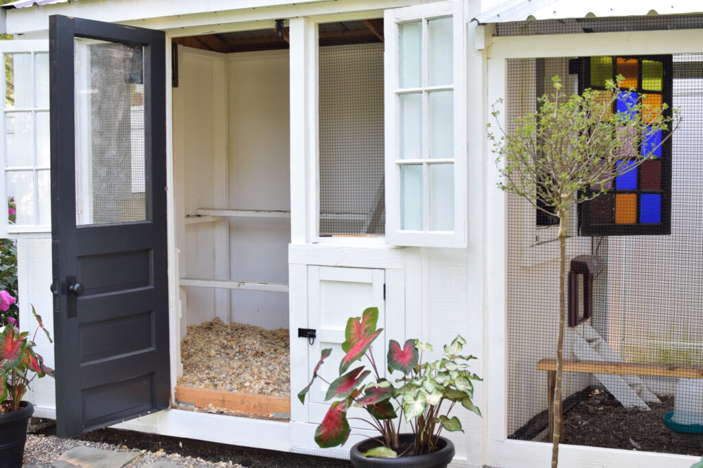 chicken coop with door and windows open