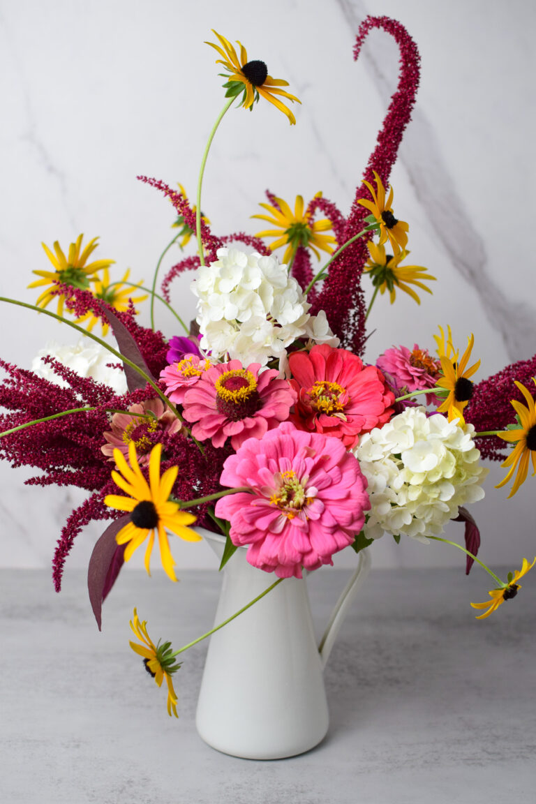 flower bouquet with zinnias, amaranth, hydrangea and black eyed Susan