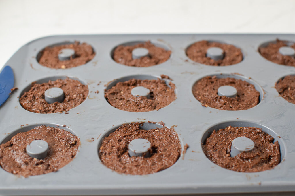 healthy donut batter in a mini pan