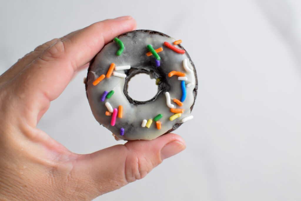 chocolate donuts with white frosting 